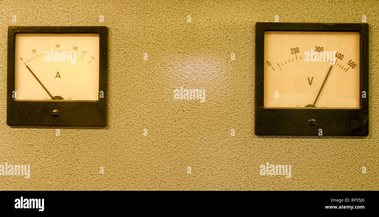 Analog ampere meter or amp meter and analog voltmeter. Stock Photo