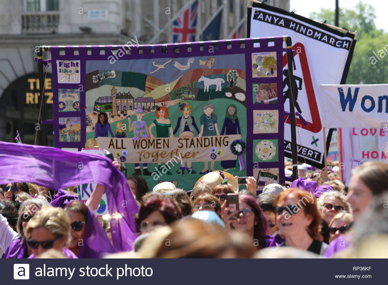 Participants in the march to celebrate the 100th anniversary of the vote for women. Stock Photo