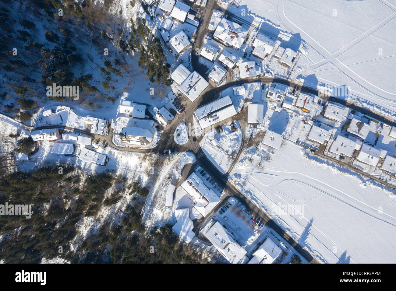 Aerial View of Itter Traditional Austrian village Covered by Snow in Winter Morning. Tourist Destination in Alps. Stock Photo