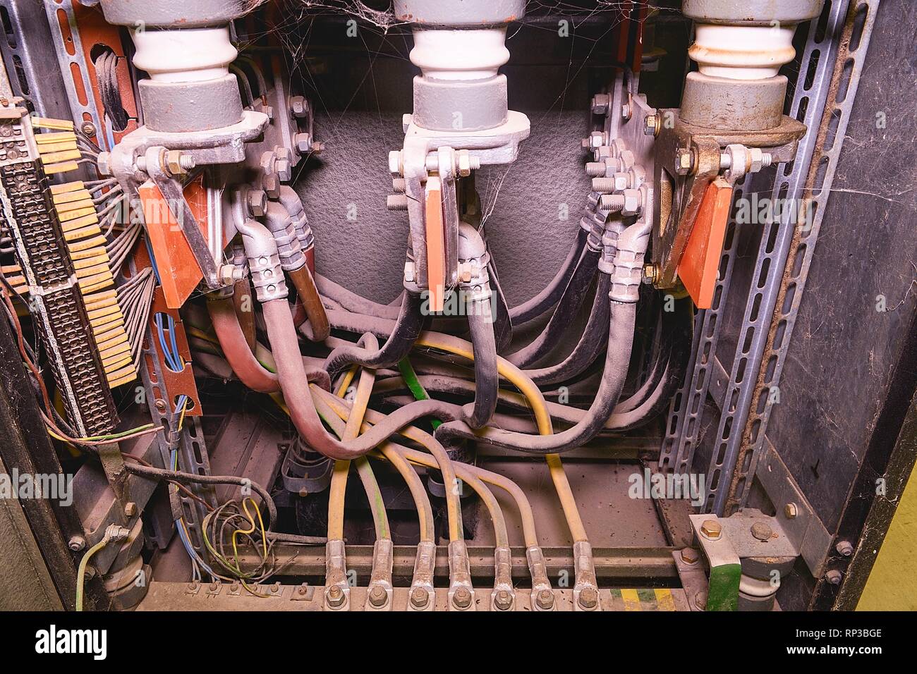 Old electrical distribution panel. Industrial distribution case. Close