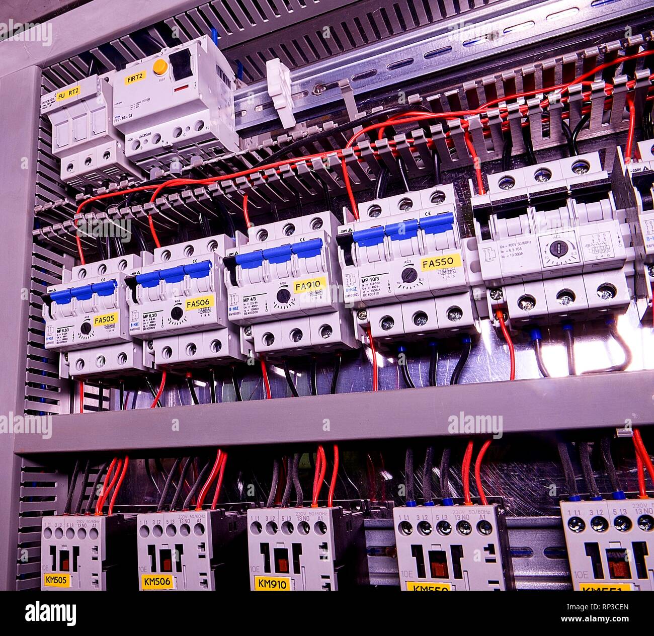 Image shows circuit breakers and electrical contactors. Closeup. Modern distribution case