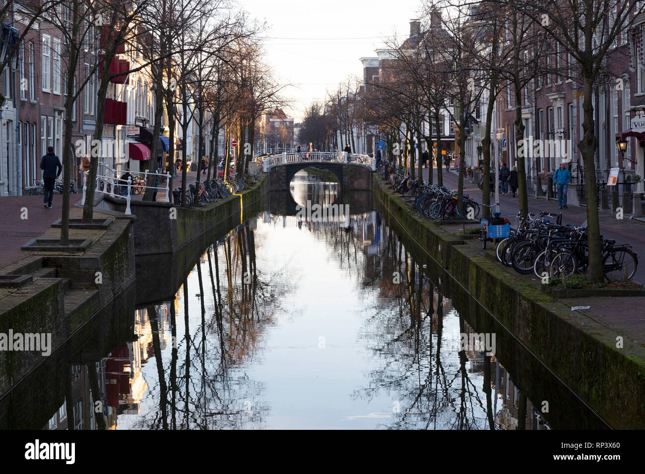 A birdge over the Oude Delft canal in Delft, the Netherlands. The canal is the oldest in the city. Stock Photo