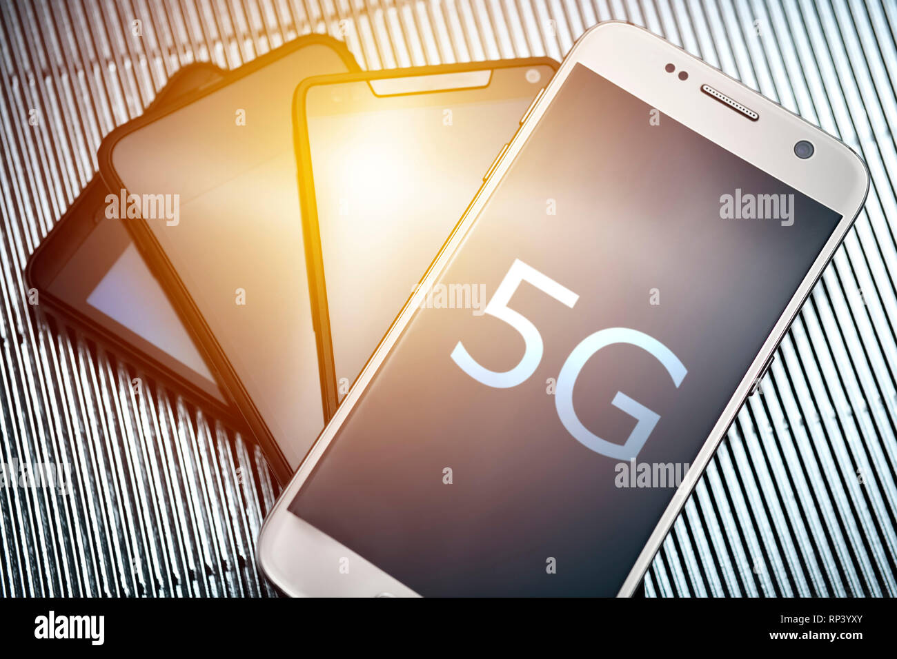 Smartphones with the label 5 g, 5G-net, Smartphones mit der Aufschrift 5G, 5G-Netz Stock Photo