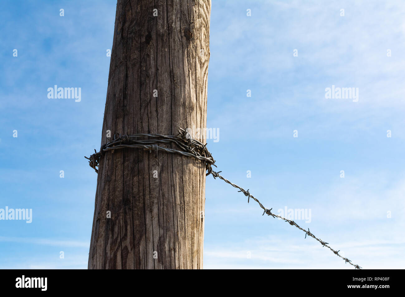 Weathered Old Wooden Fence Post With Barbed Wire High Resolution Stock ...