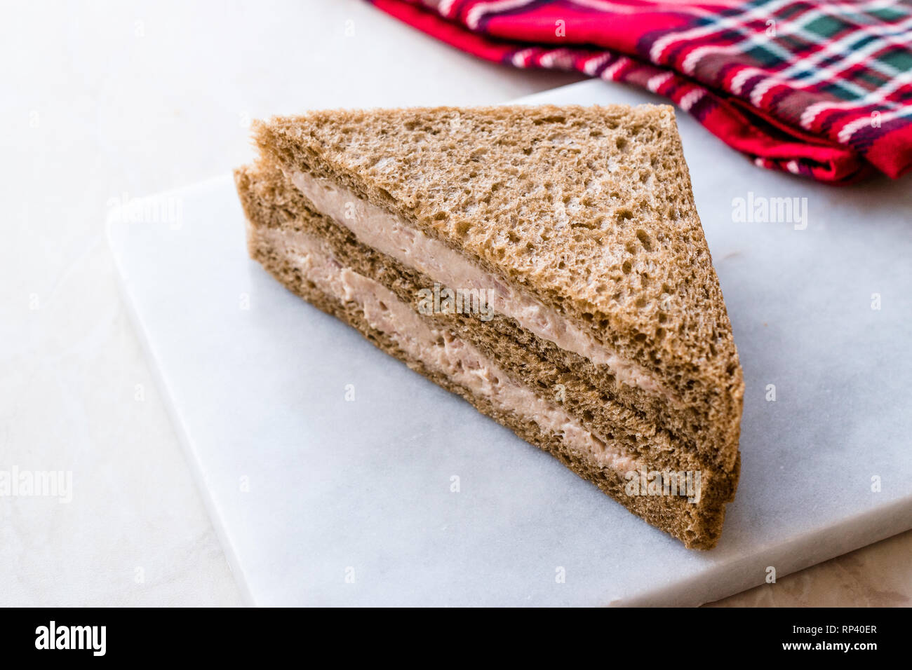 Triangle Light Sandwich with Tuna Fish Paste on Marble Board. Fast food