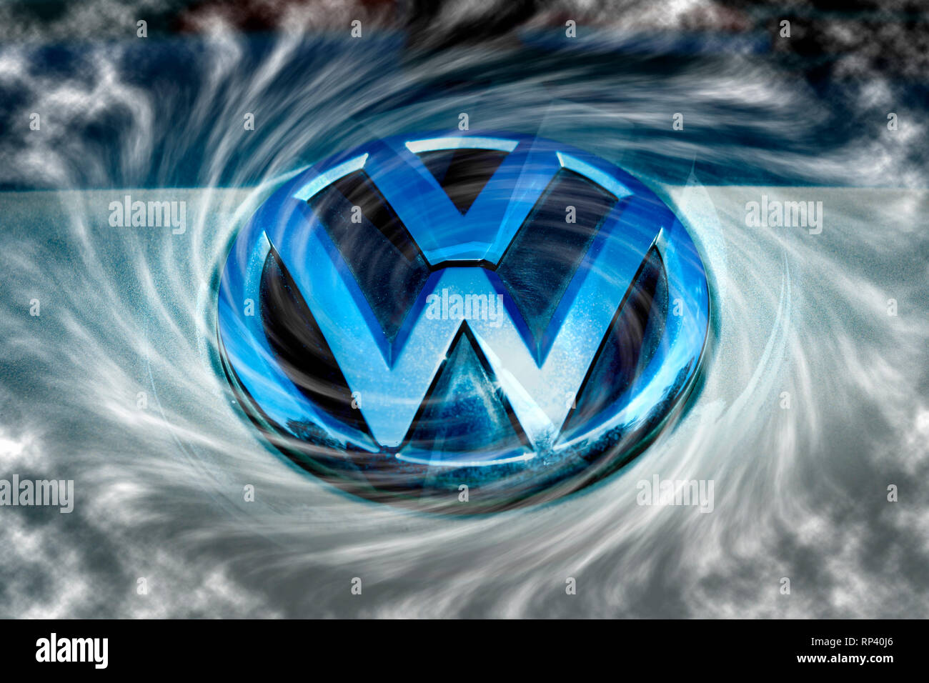 VW signs on a car and exhaust gases, symbolic photo diesel scandal, VW-Zeichen auf einem Auto und Abgase, Symbolfoto Dieselskandal Stock Photo