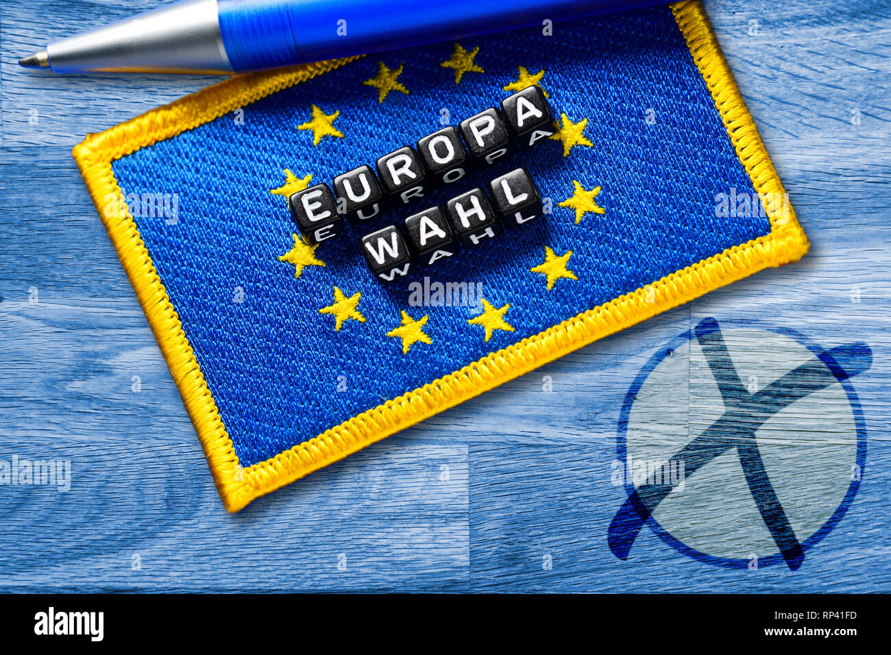 Stroke European choice on EU flag with electoral cross, Schriftzug Europawahl auf EU-Fahne mit Wahlkreuz Stock Photo