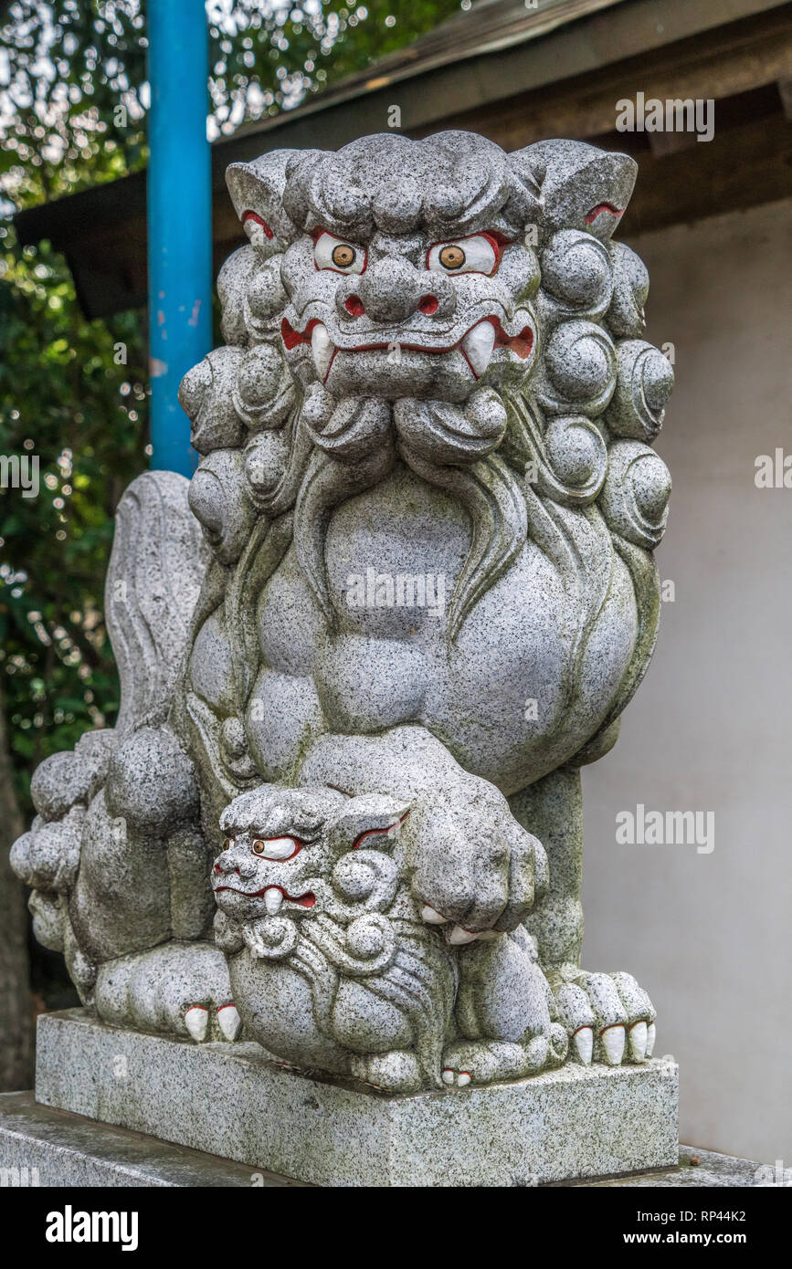 Stone carved Komainu Liondog guardian at Suzukamyo Shrine, Located in Zama city, Kanagawa