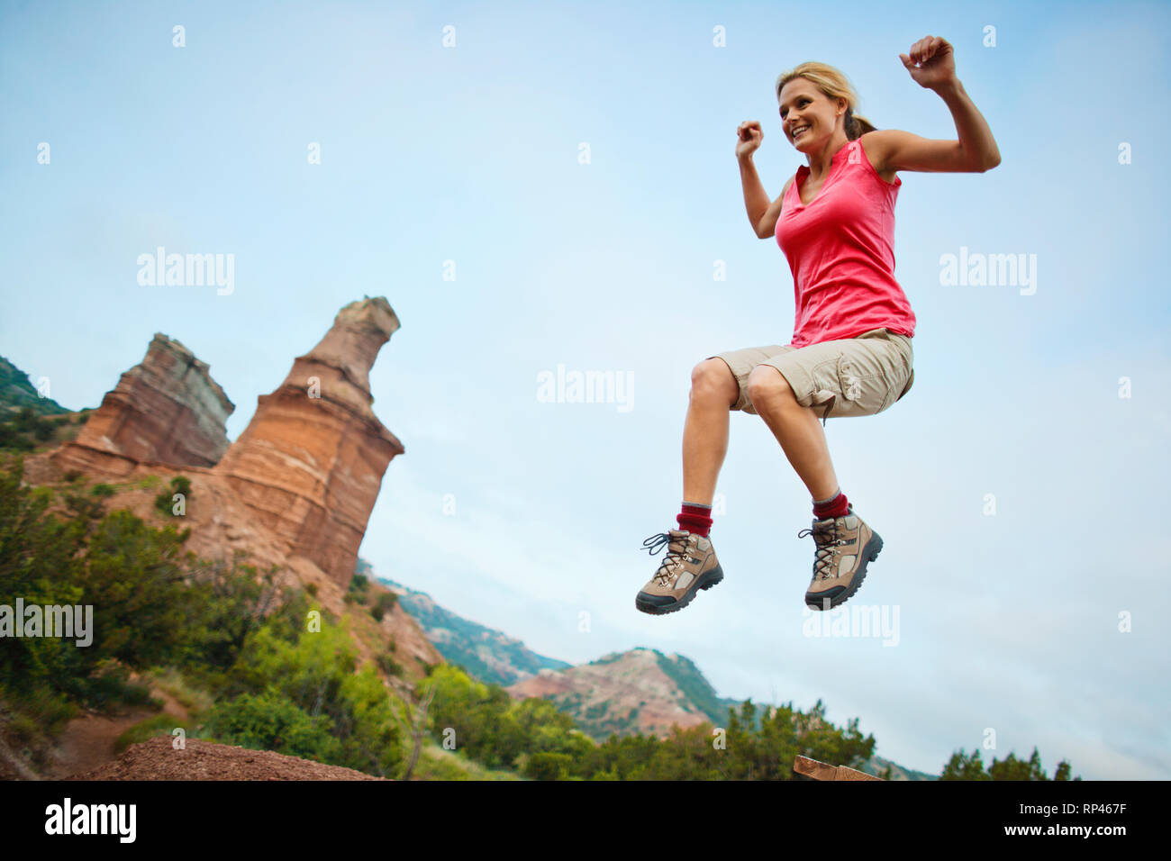 Happy woman tourist jumps hi-res stock photography and images - Alamy