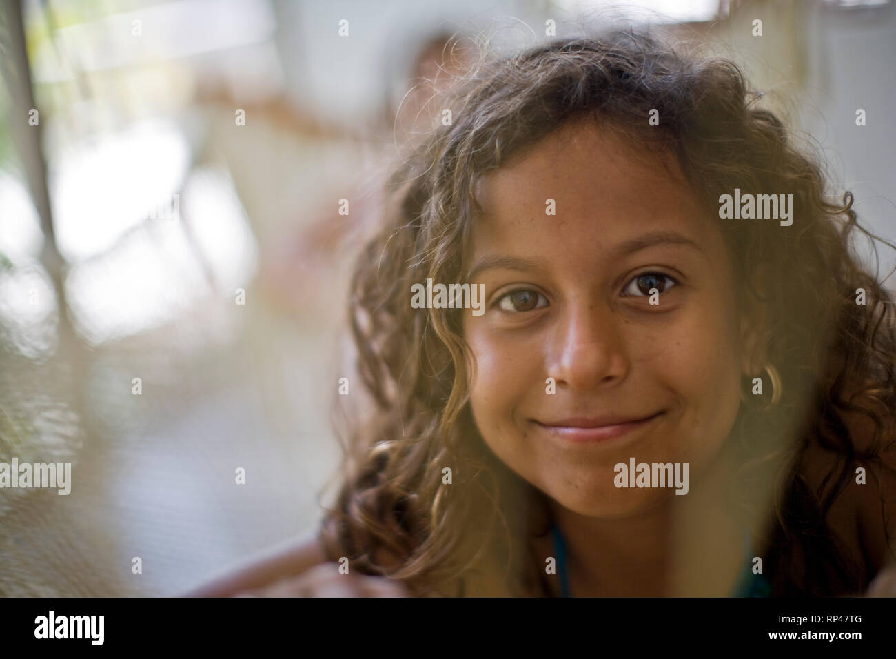 Portrait of a young girl lying in a hammock Stock Photo - Alamy
