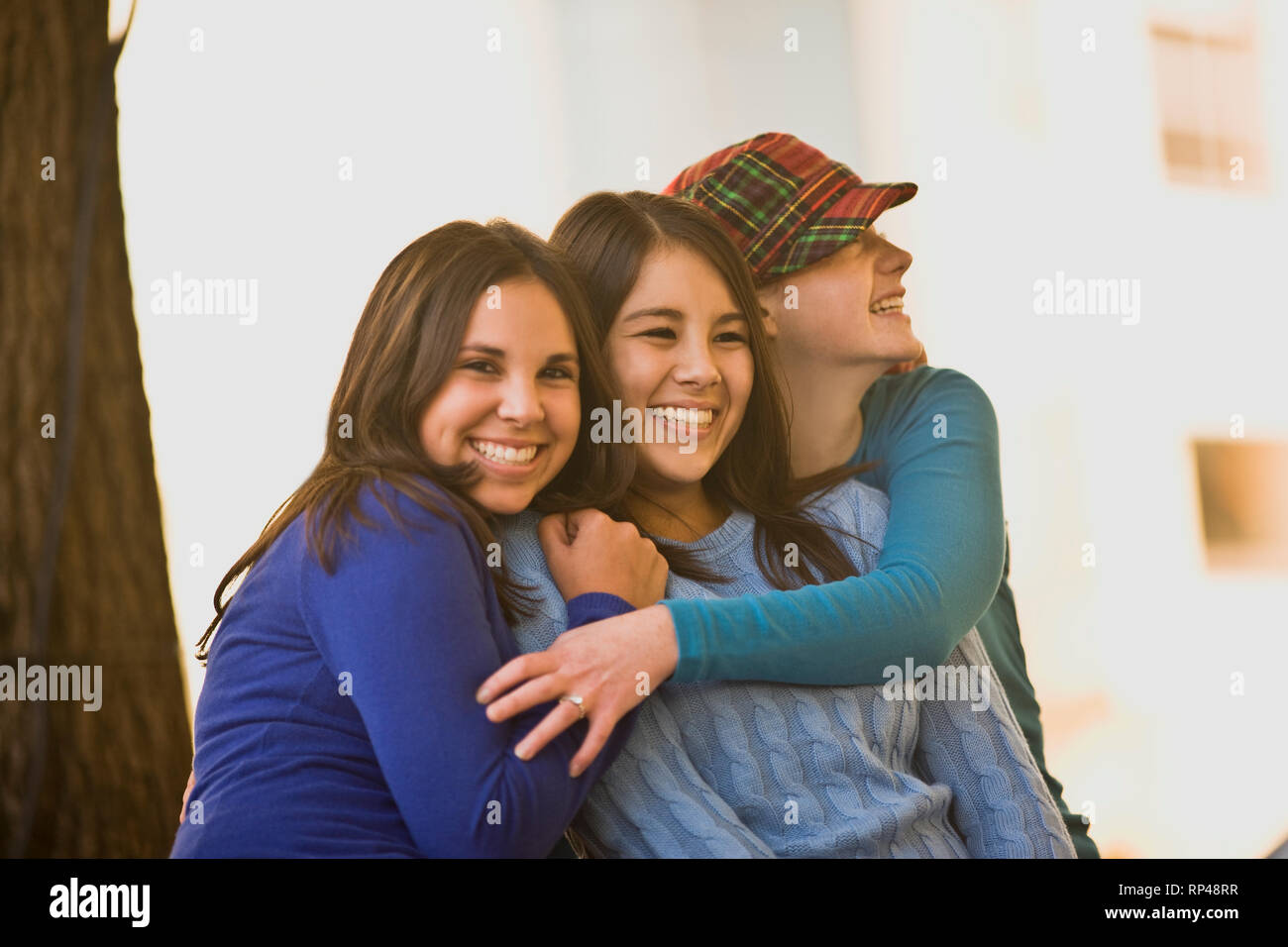 Girls hugging each other Stock Photo
