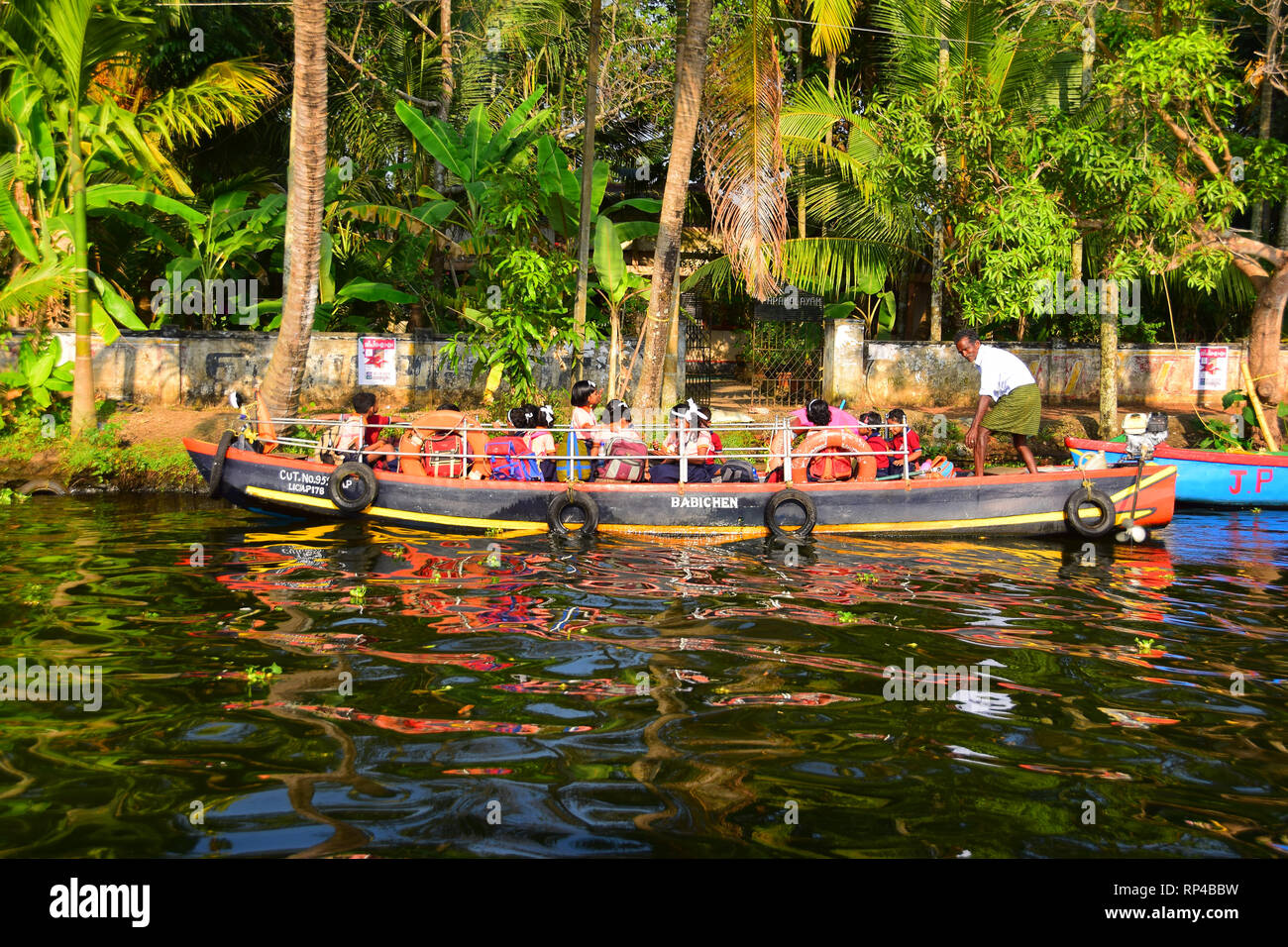 Boats & Palms, Kerala Backwaters, Kerala, India Stock Photo