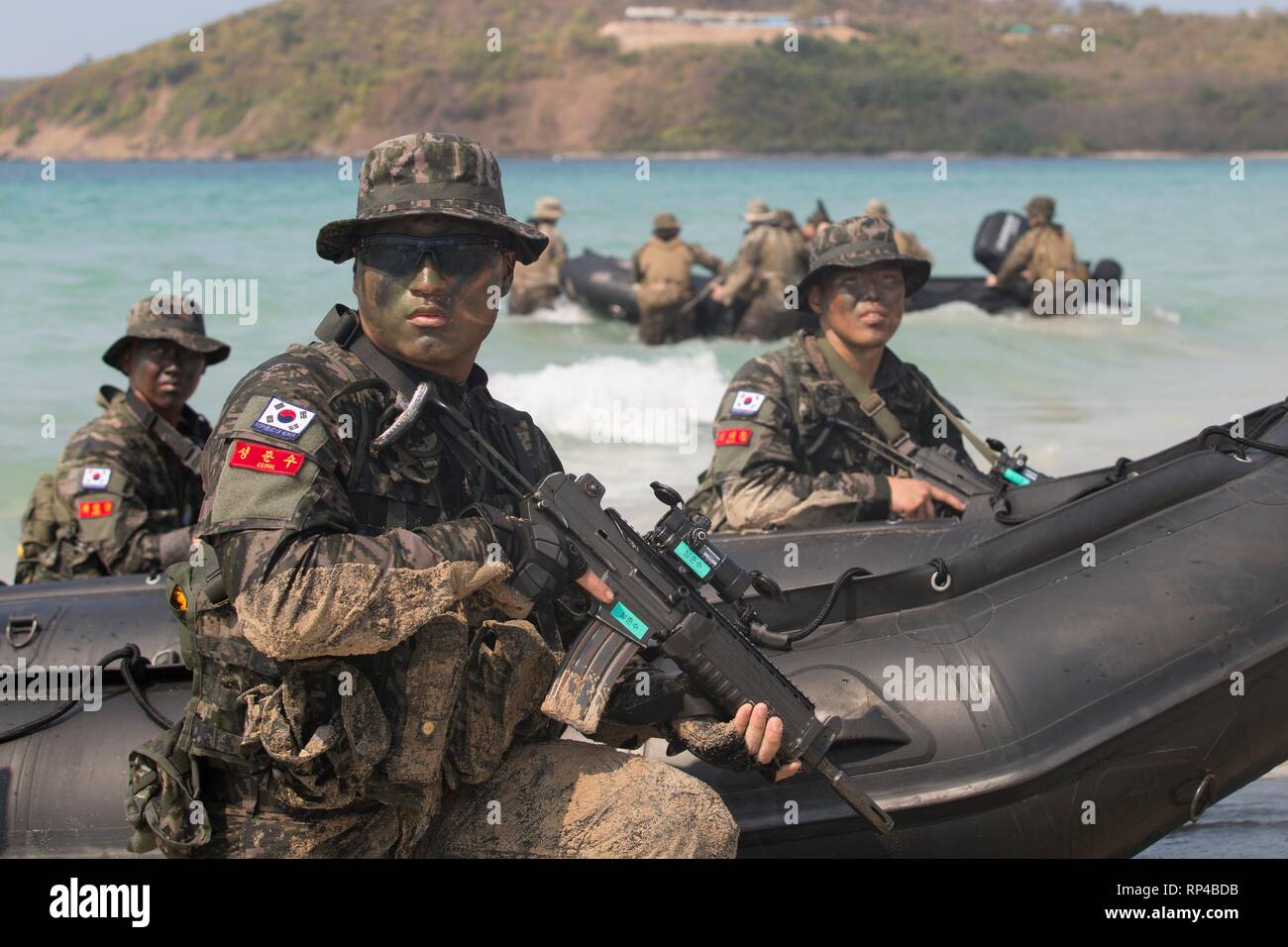 South Korean Marines with rubber raiding rafts at an amphibious assault exercise during Cobra Gold 19 at Hat Yao Beach February 15, 2019 in Sattahip, Thailand. Cobra Gold is the largest annual joint military cooperation exercise in the Indo-Pacific region. Stock Photo