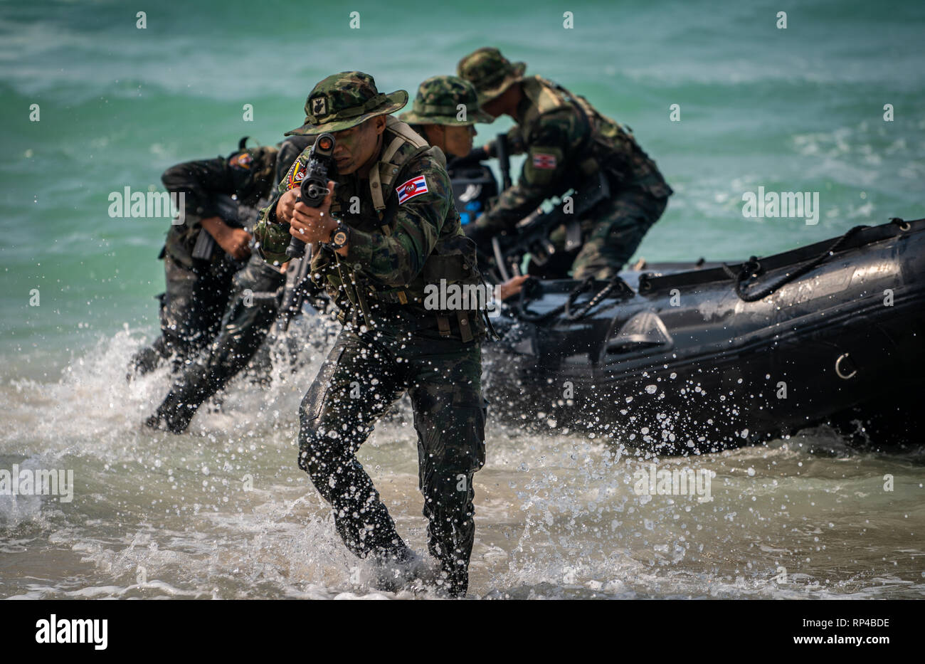 Royal Thai reconnaissance Marines storm a beach in an amphibious assault exercise during Cobra Gold 19 at Hat Yao Beach February 16, 2019 in Sattahip, Thailand. Cobra Gold is the largest annual joint military cooperation exercise in the Indo-Pacific region. Stock Photo