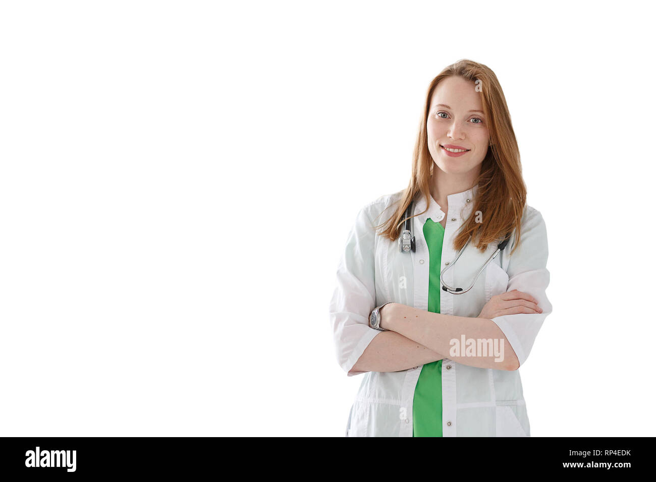 Portrait of smiling woman doctor with stethoscope in medical gown isolated on white background. Stock Photo