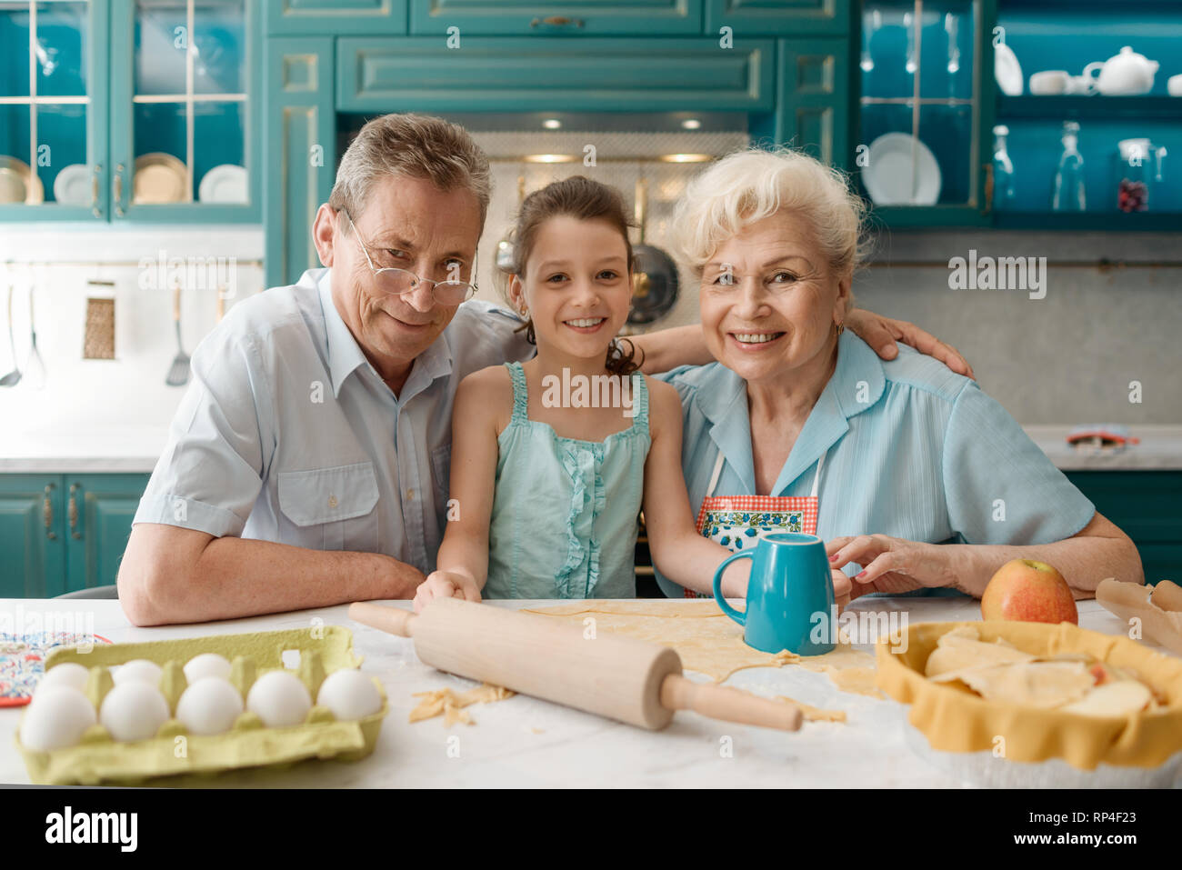 Little girl with her grandparents Stock Photo - Alamy