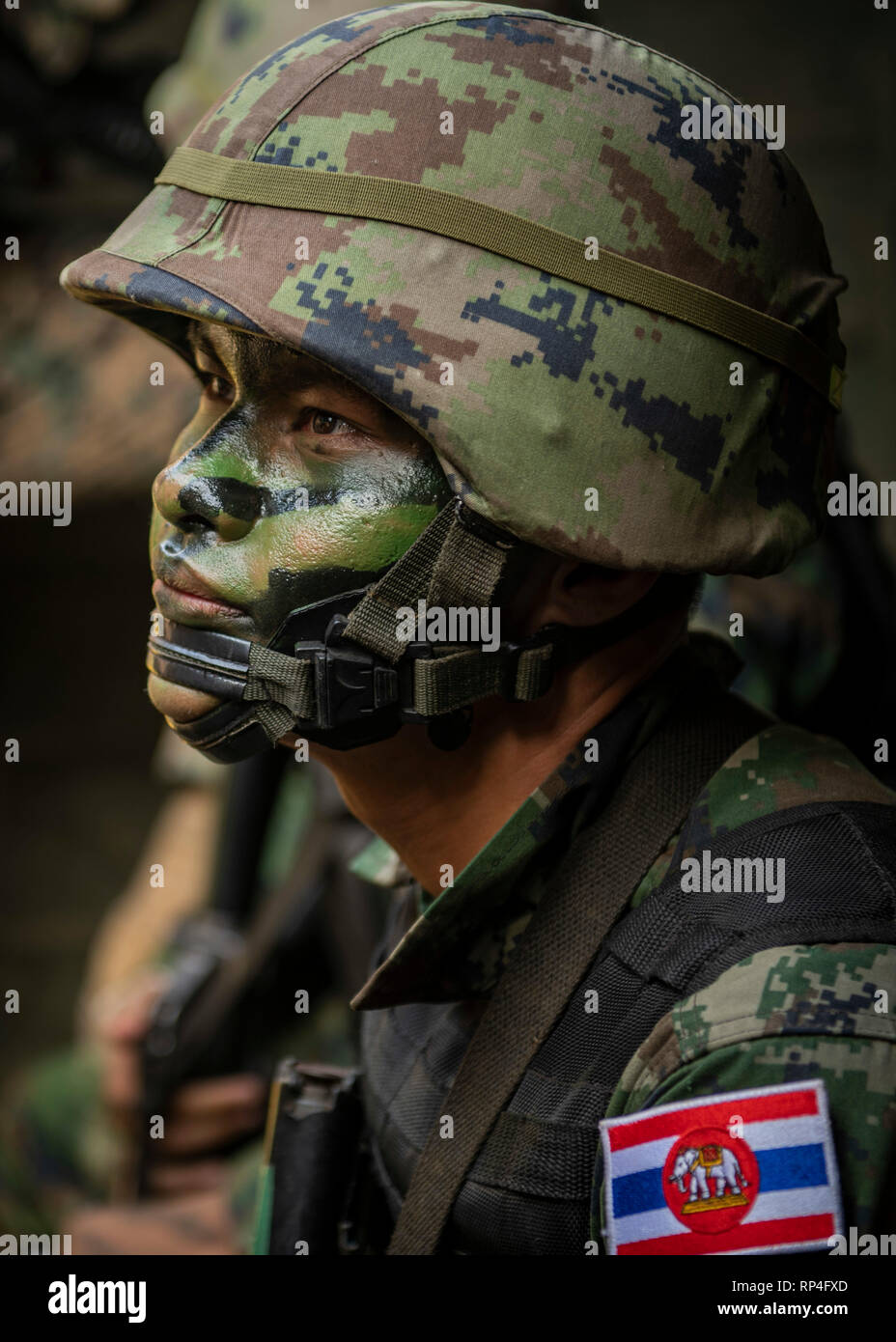 Royal Thai Marines wearing camouflage face paint at a live-fire exercise during Cobra Gold 19 at the Ban Chan Krem training area February 20, 2019 in Chantaklem, Thailand. Cobra Gold is the largest annual joint military cooperation exercise in the Indo-Pacific region. Stock Photo