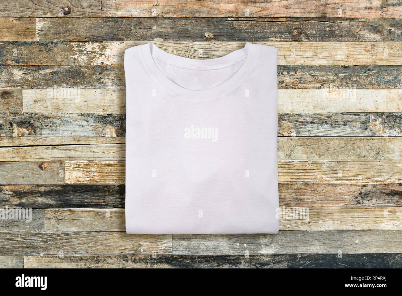 Download Blank White Folded T Shirt On Wooden Background Stock Photo Alamy