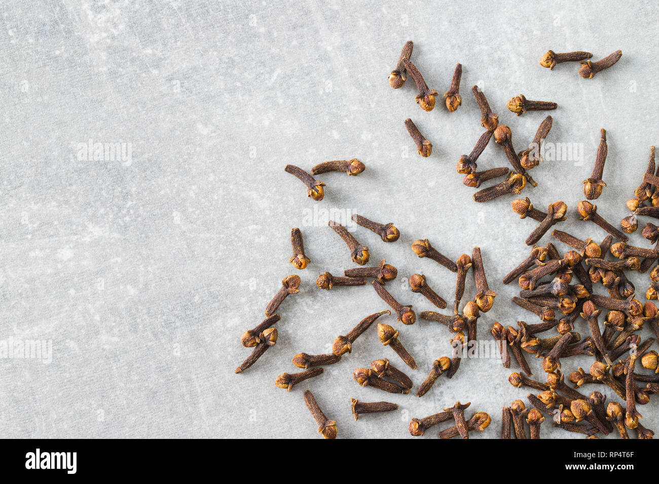 Carnation, dried clove spice on kitchen table Stock Photo - Alamy