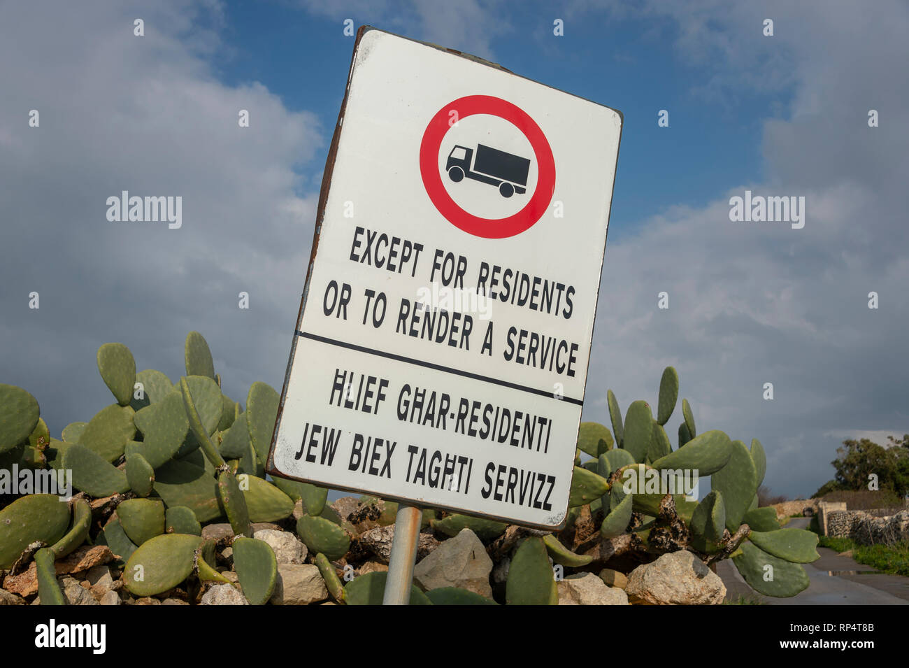 Road sign, 'Except for residents or to render a service'. No entry. Stock Photo