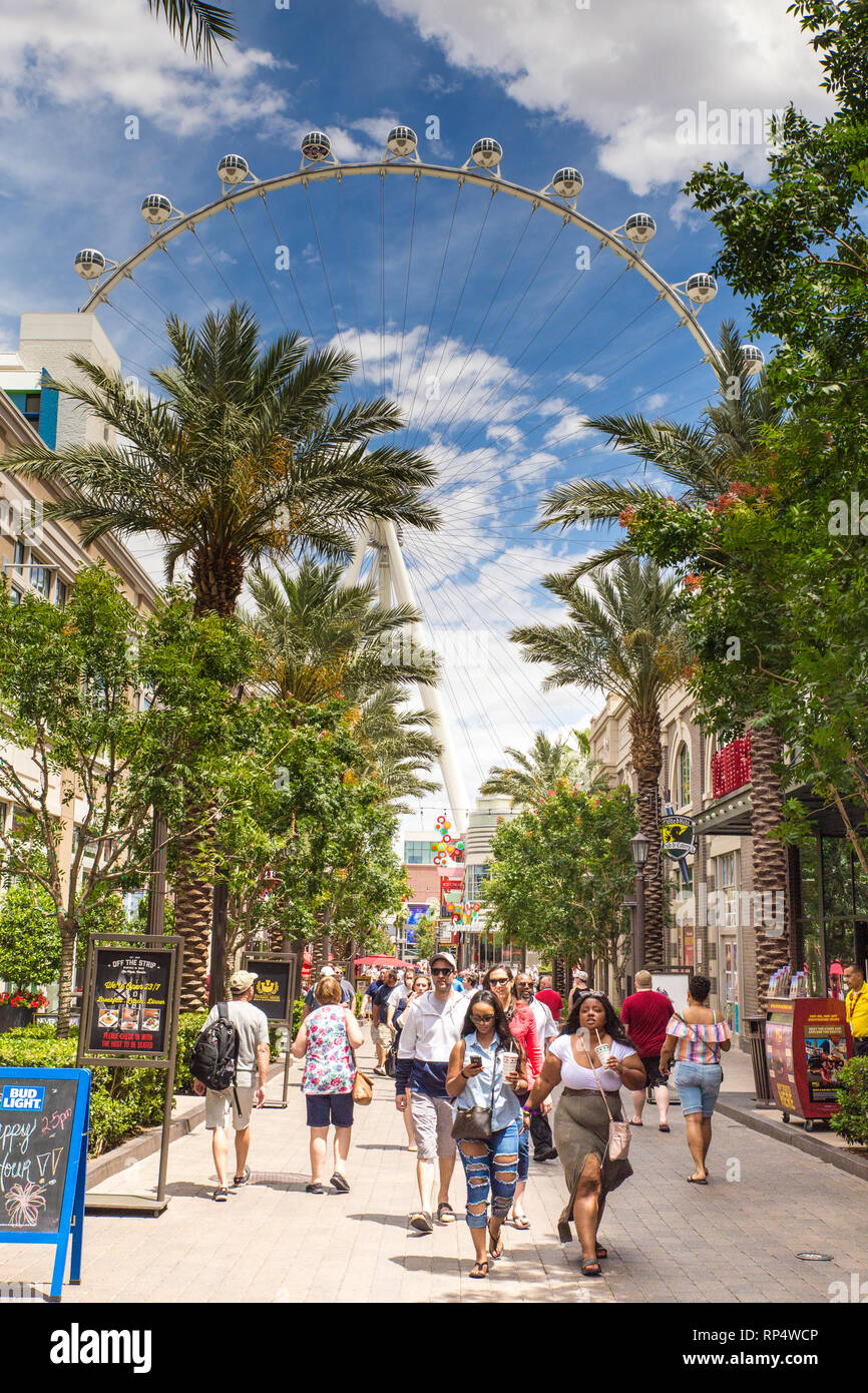 LAS VEGAS, NEVADA - MAY 17, 2018:  View of outdoor Linq Promenade pedestrian plaza off the Vegas Strip with people in view. Stock Photo