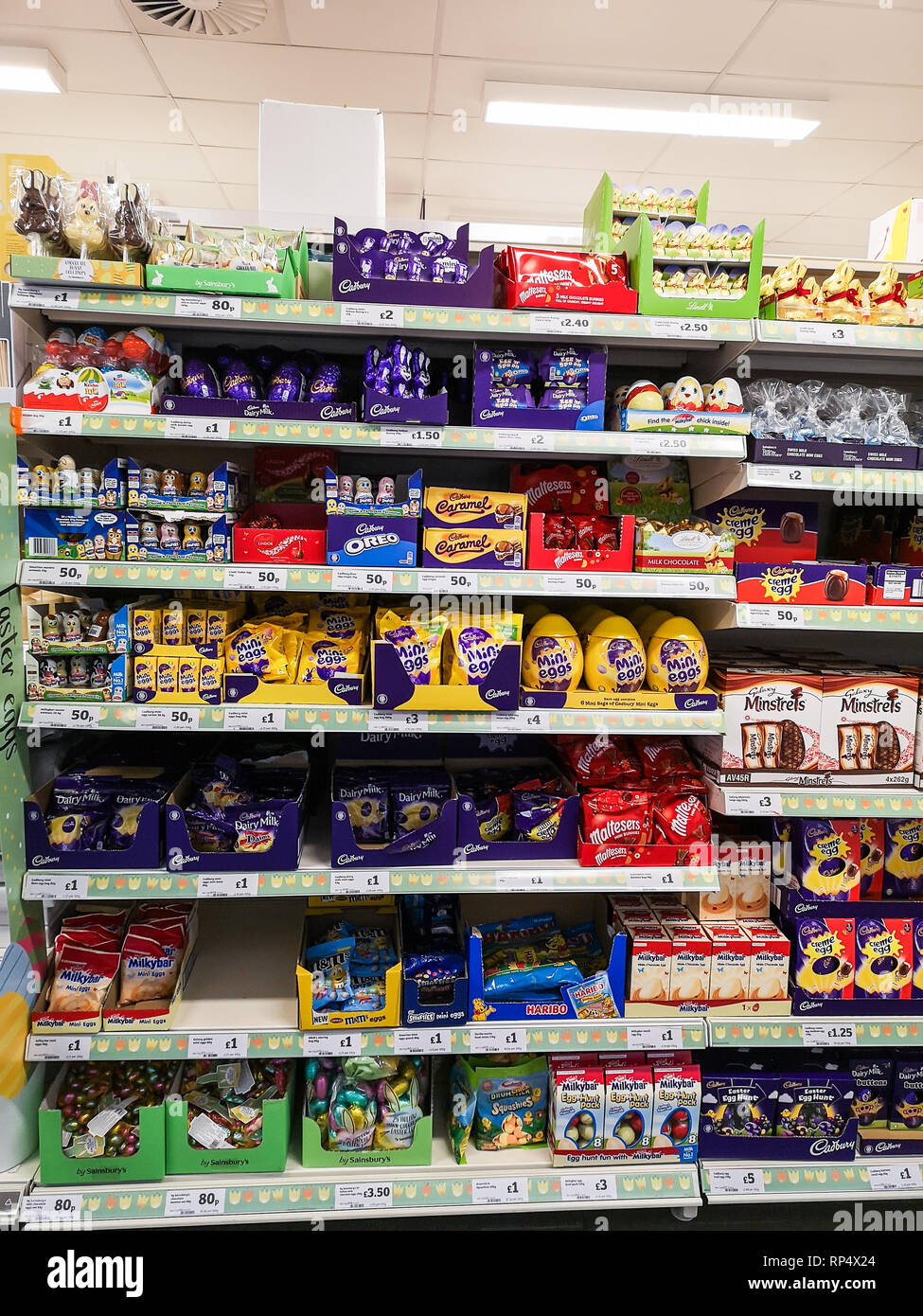 Manchester, UK - Feb 18th, 2019: Selection of different chocolate easter eggs on shelves in a shop store before the Easter holidays. Stock Photo