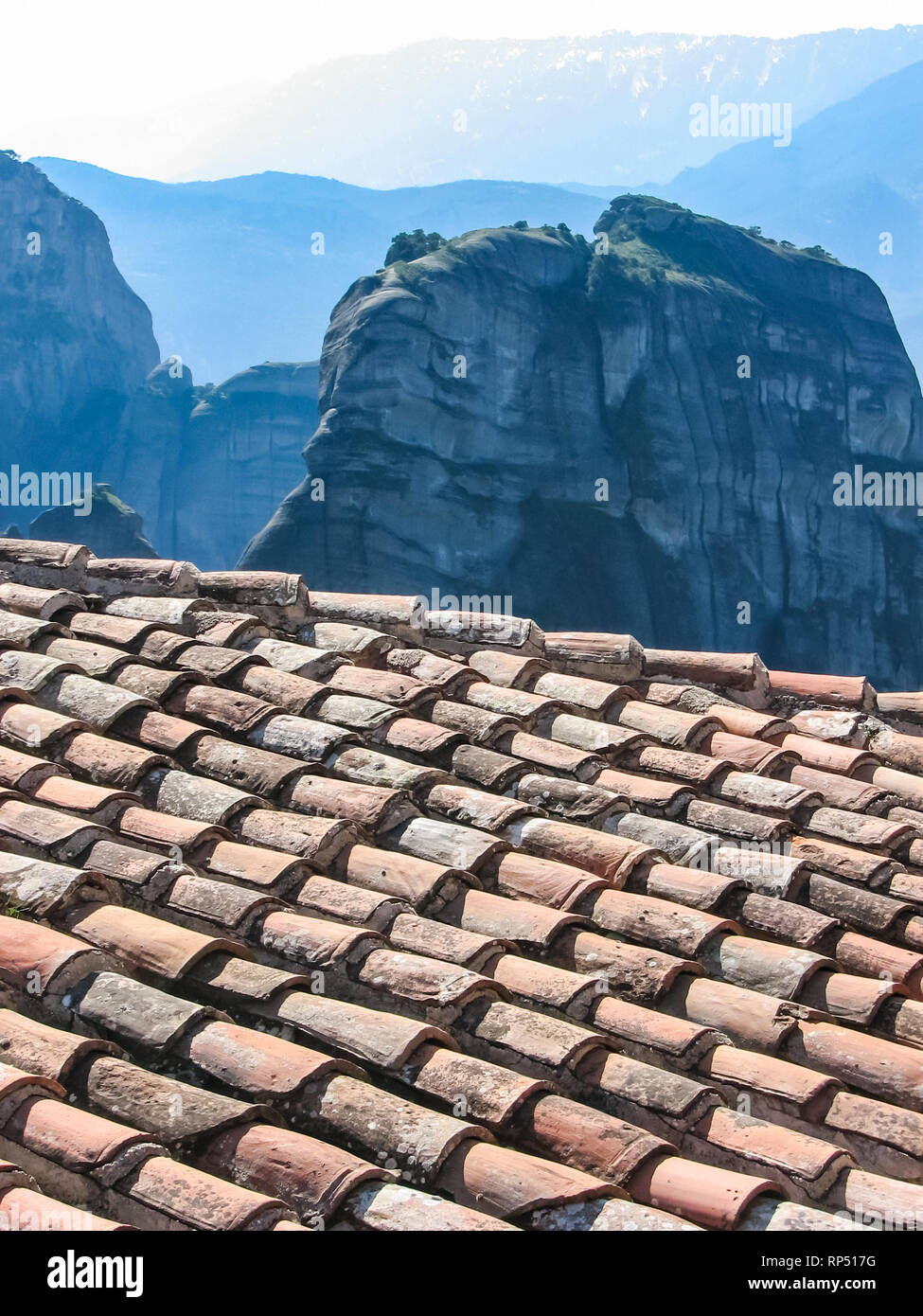 old roof tiles reinforced with cement. Meteora monasteries on the rocks