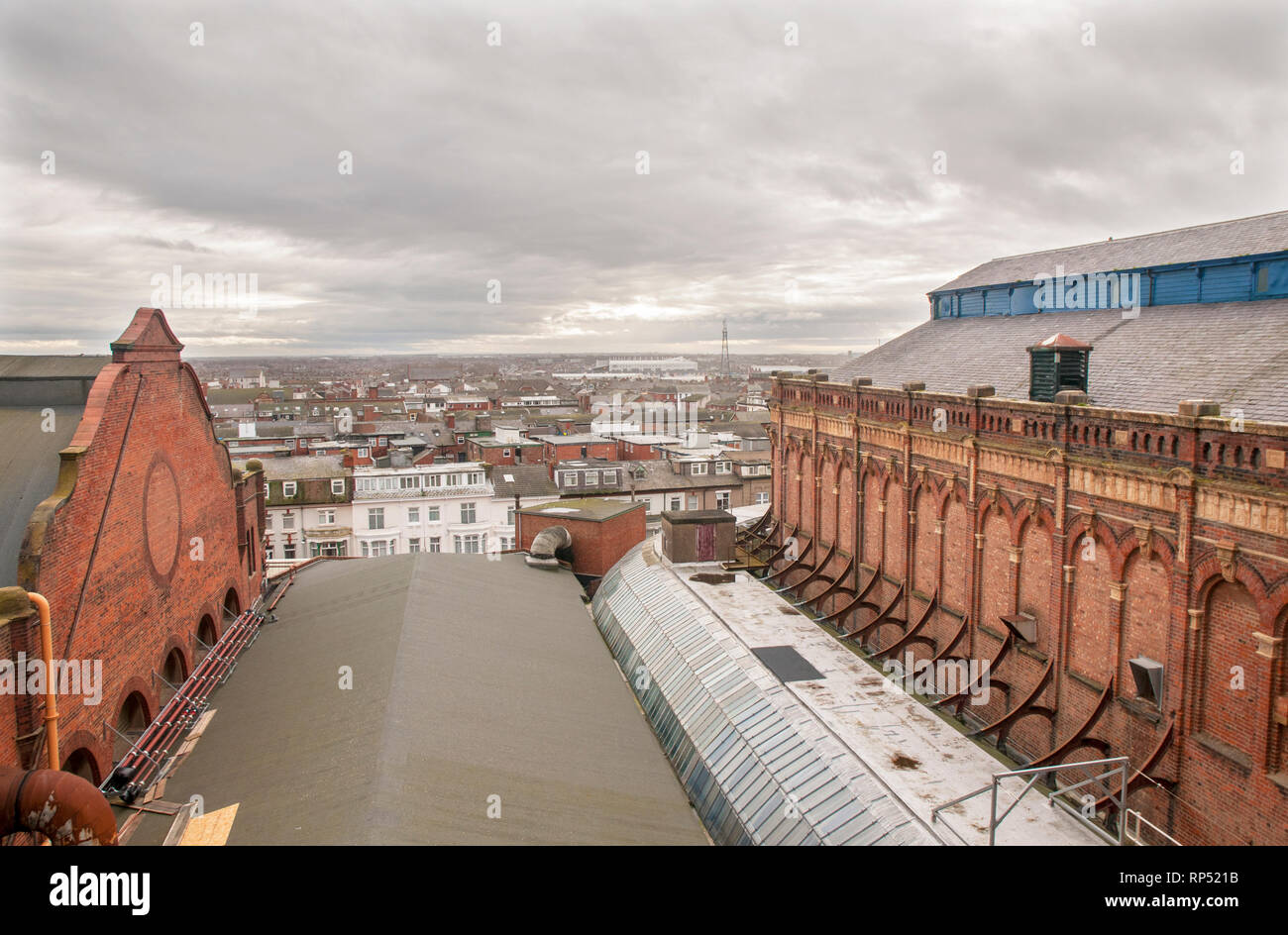 View looking south over Blackpool from top of the Opera House in the Winter Gardens building  Glass top of Winter Gardens pavilion seen on lower right Stock Photo