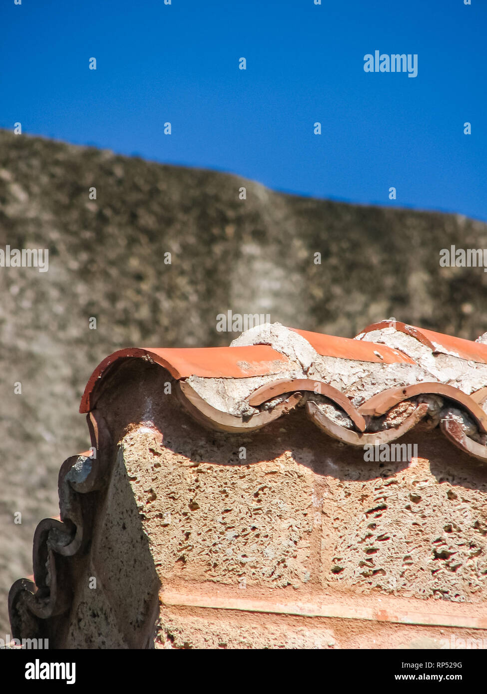 old roof tiles reinforced with cement. Meteora monasteries on the rocks