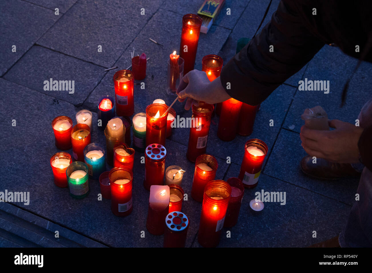 A demonstrator seen lighting candles during the protest. Protest in Puerta del Sol of Madrid against the energetic poverty in Spanish families as a result of the economic crisis defending a model of clean energy and under social control. It is estimated that 6.8 million people suffer from energy poverty in Spain. Stock Photo
