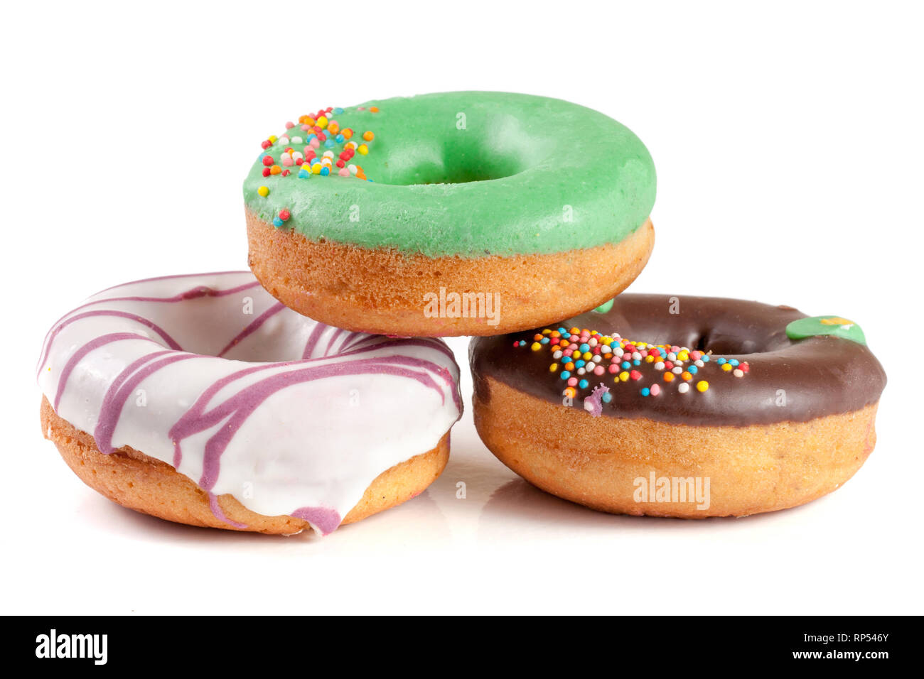 three glazed donut isolated on white background Stock Photo - Alamy