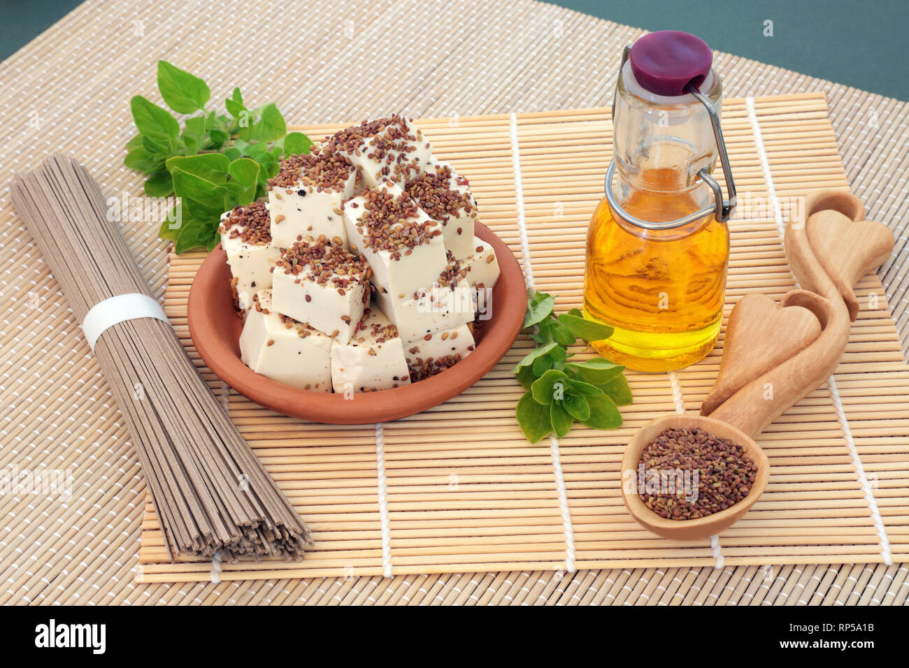 Vegan health food with tofu bean curd dusted with alfalfa seed and