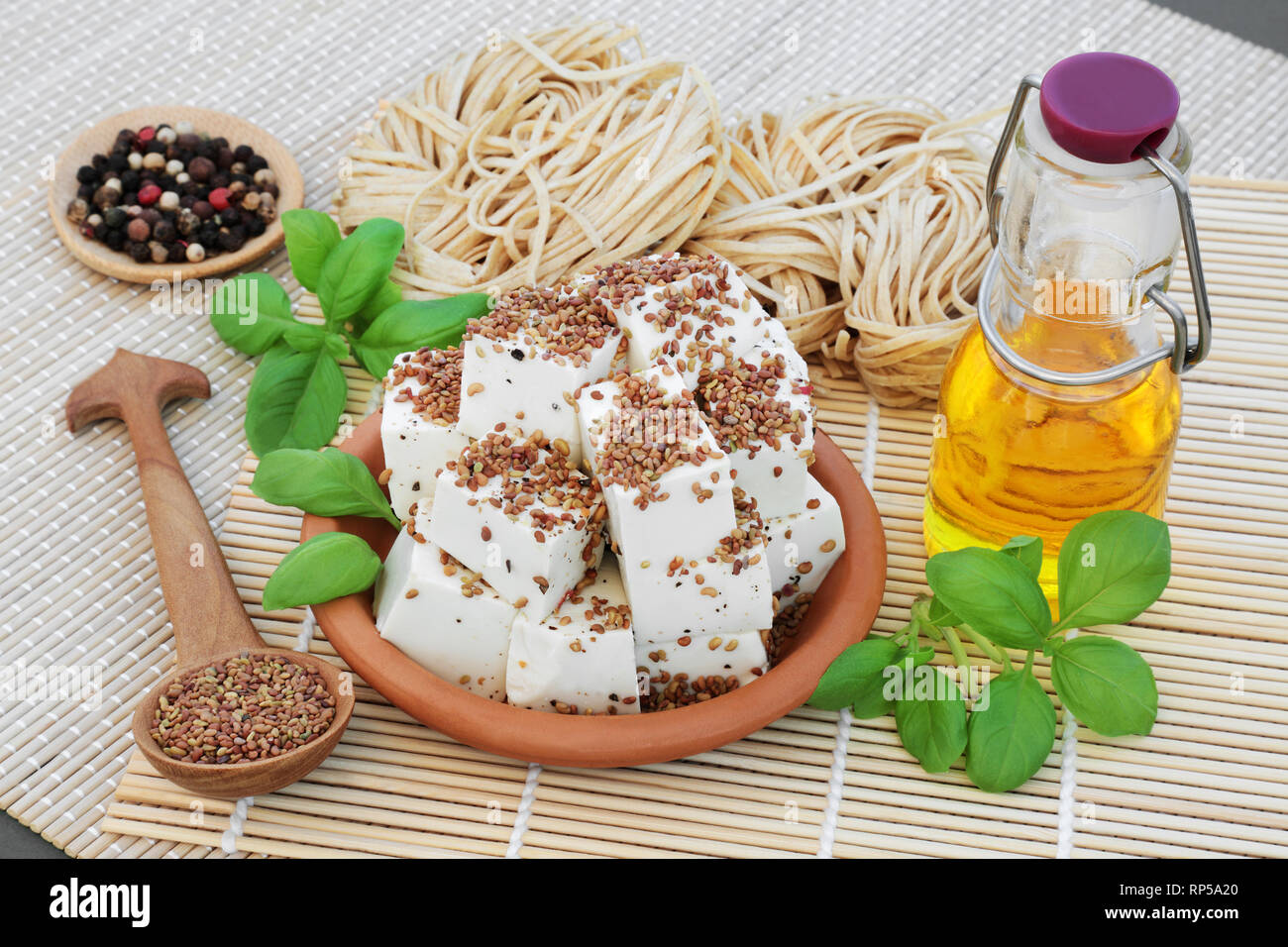 Tofu bean curd dusted with alfalfa seed and ground peppercorns, with