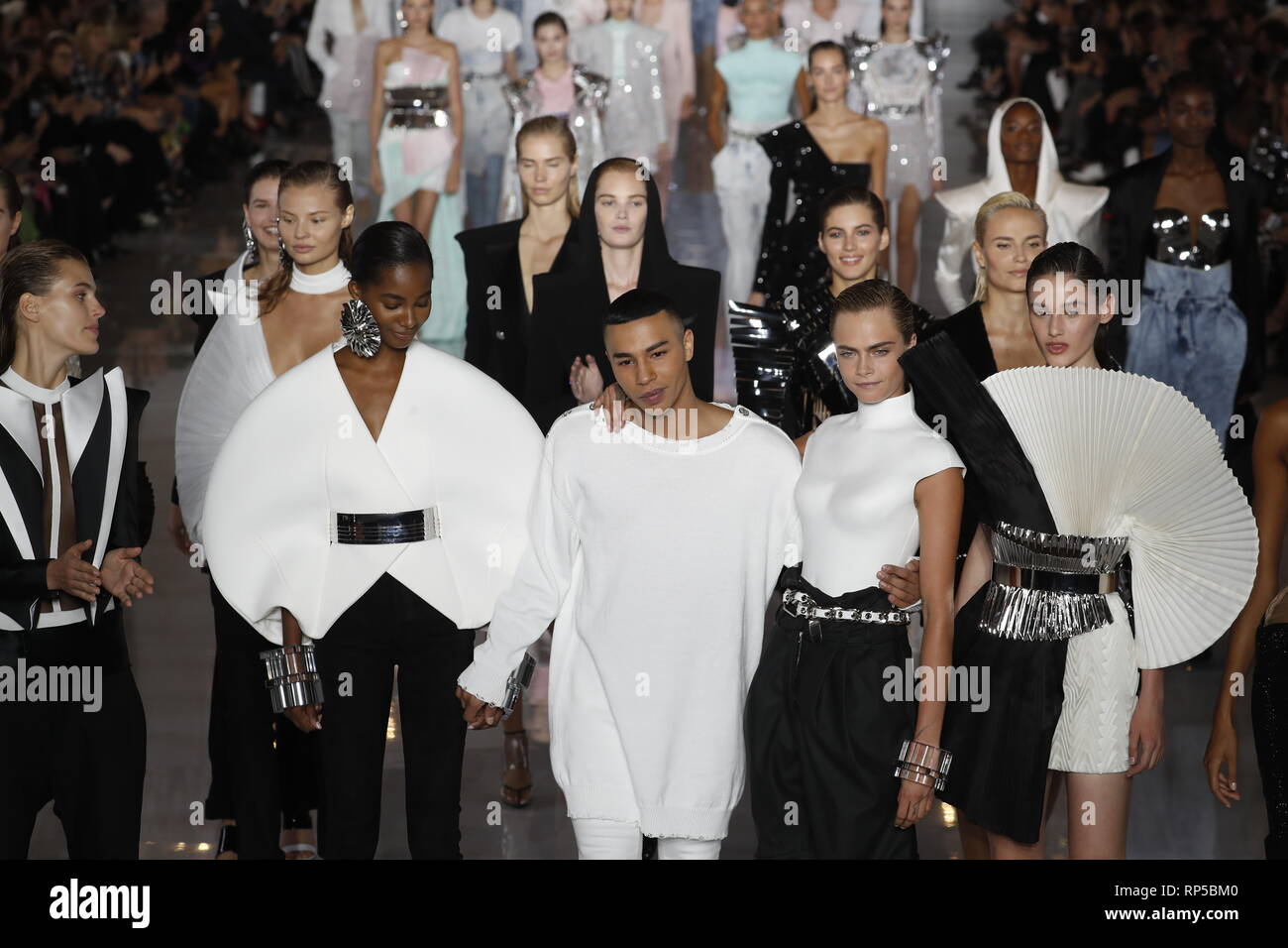PARIS, FRANCE - SEPTEMBER 28: Designer Olivier Rousteing (C) and model Cara  Delevingne (5thR) are applauded on the runway during the Balmain show Stock  Photo - Alamy