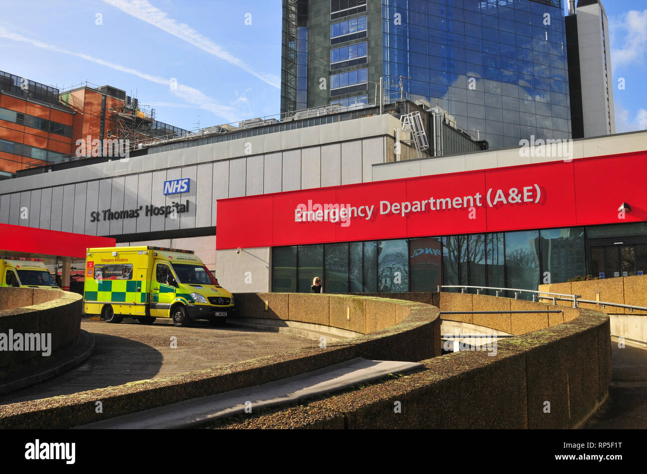 A Mercedes Benz ambulance is parked outside St Thomas' Hospital Emergency Department (A&E) in London on a sunny day. Stock Photo