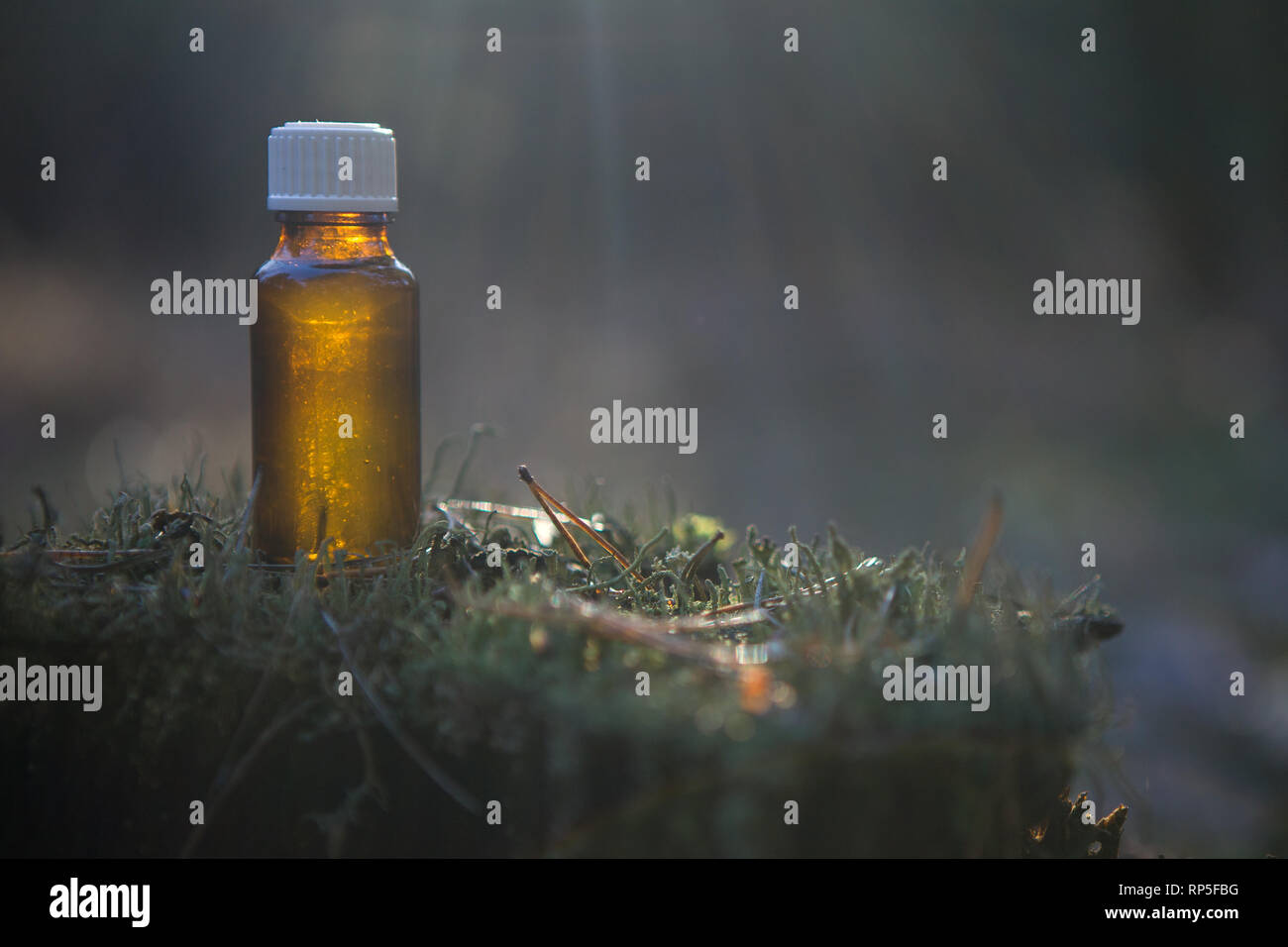 Essential oil - Herb Therapy, bottle. FLORITERAPIA and Naturopathic Medicine. Stock Photo