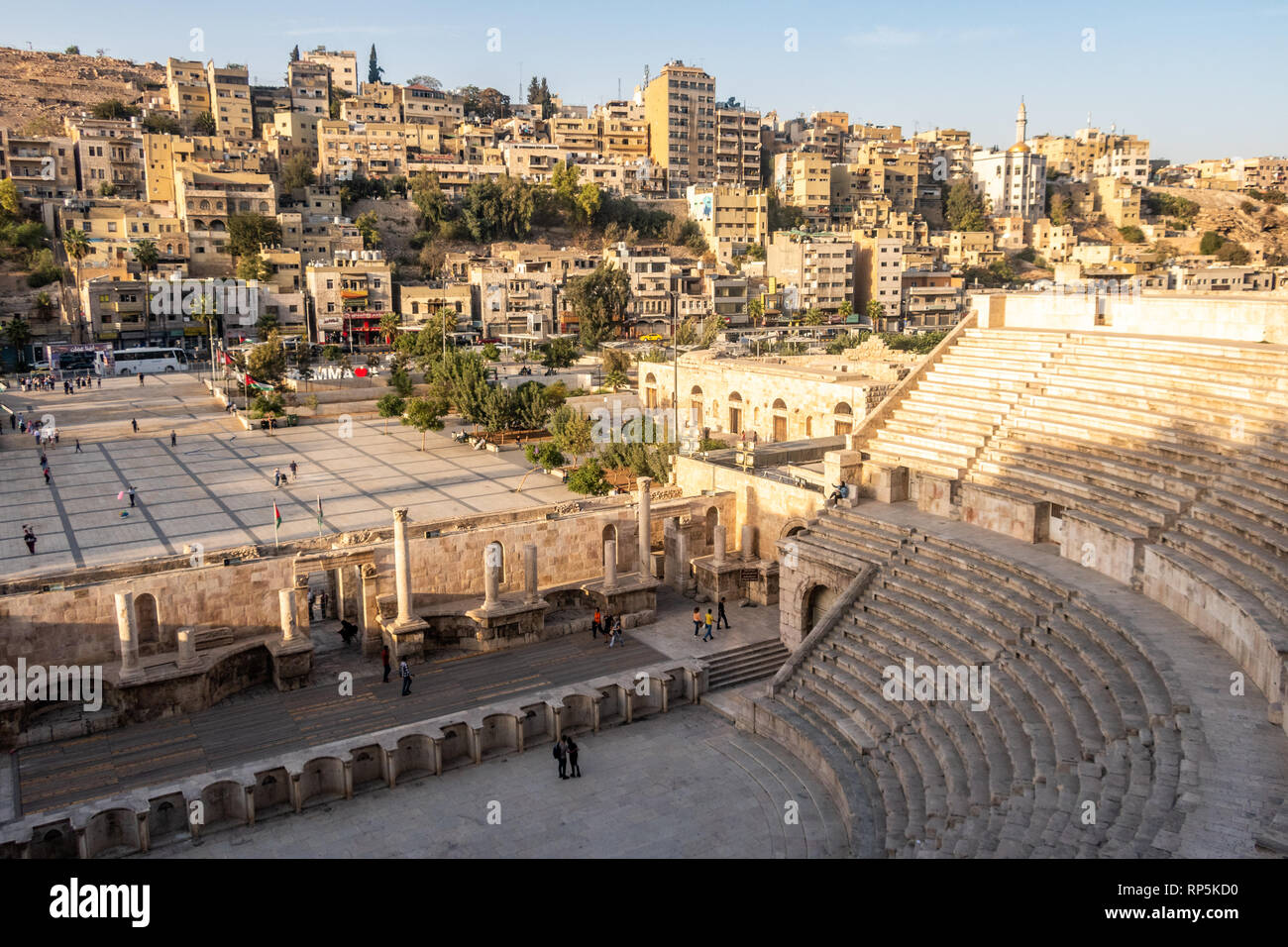 View of the Jordanian capital Amman, featuring the Roman amphitheatre and the smaller ancient amphitheatre Odeon, flanking the Hashemite Plaza. Stock Photo