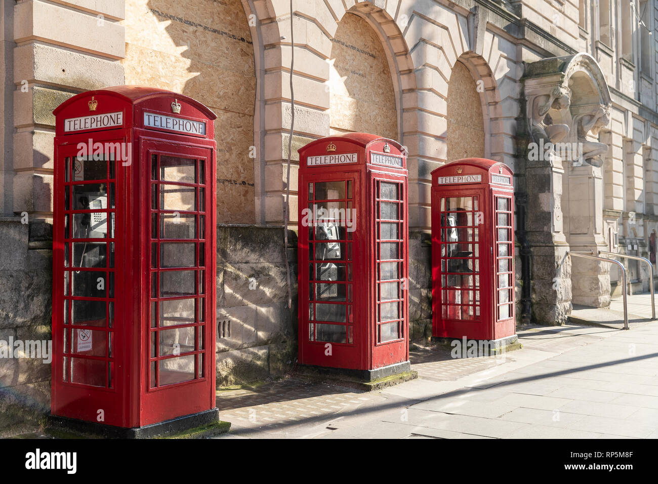 Three Red Telephone Boxes Stock Photo