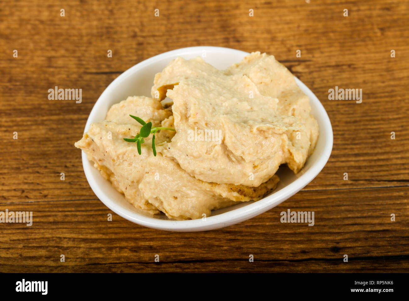 Vegetarian Humus with sesame seeds and thyme leaves Stock Photo Alamy
