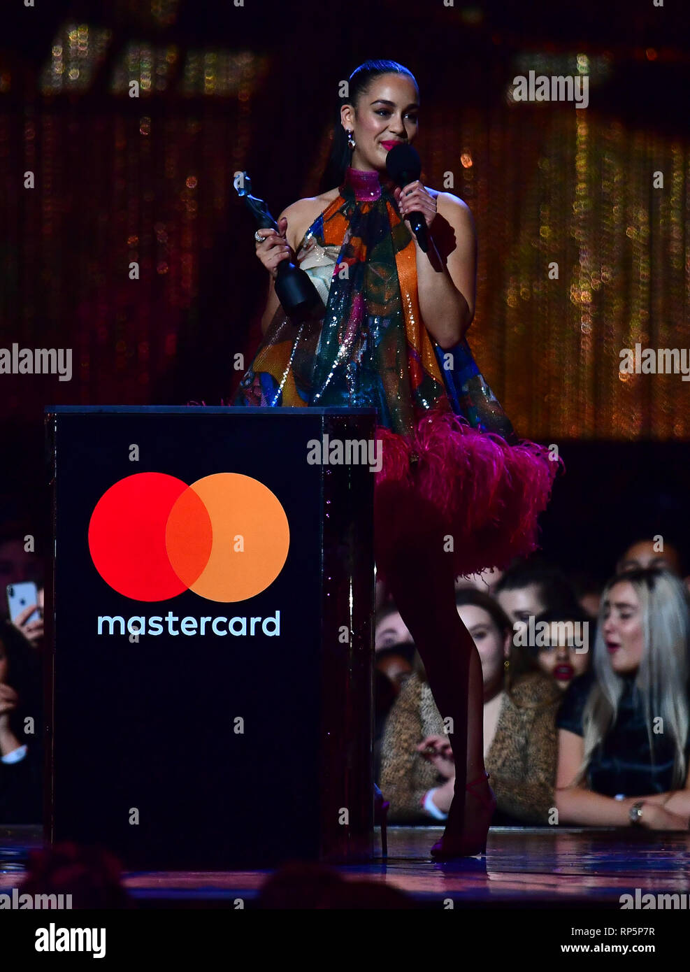 Smith accepts the award for Best Female Solo Artist on stage at