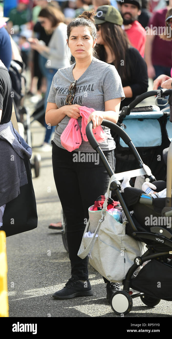 America Ferrera samples Kombucha drinks and peruses the produce at the