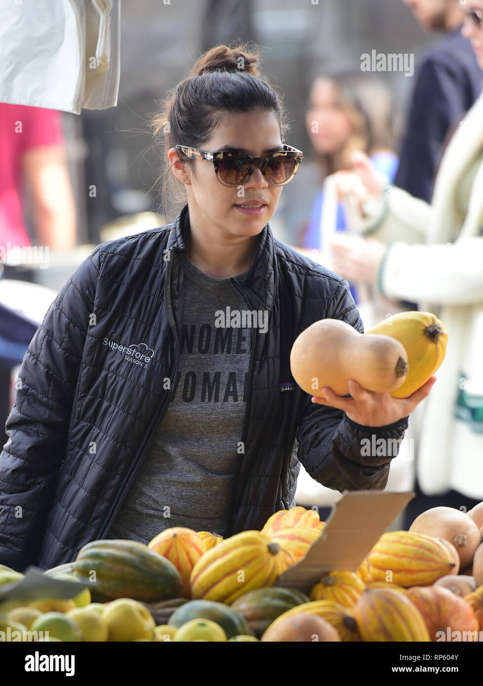 America Ferrera samples Kombucha drinks and peruses the produce at the