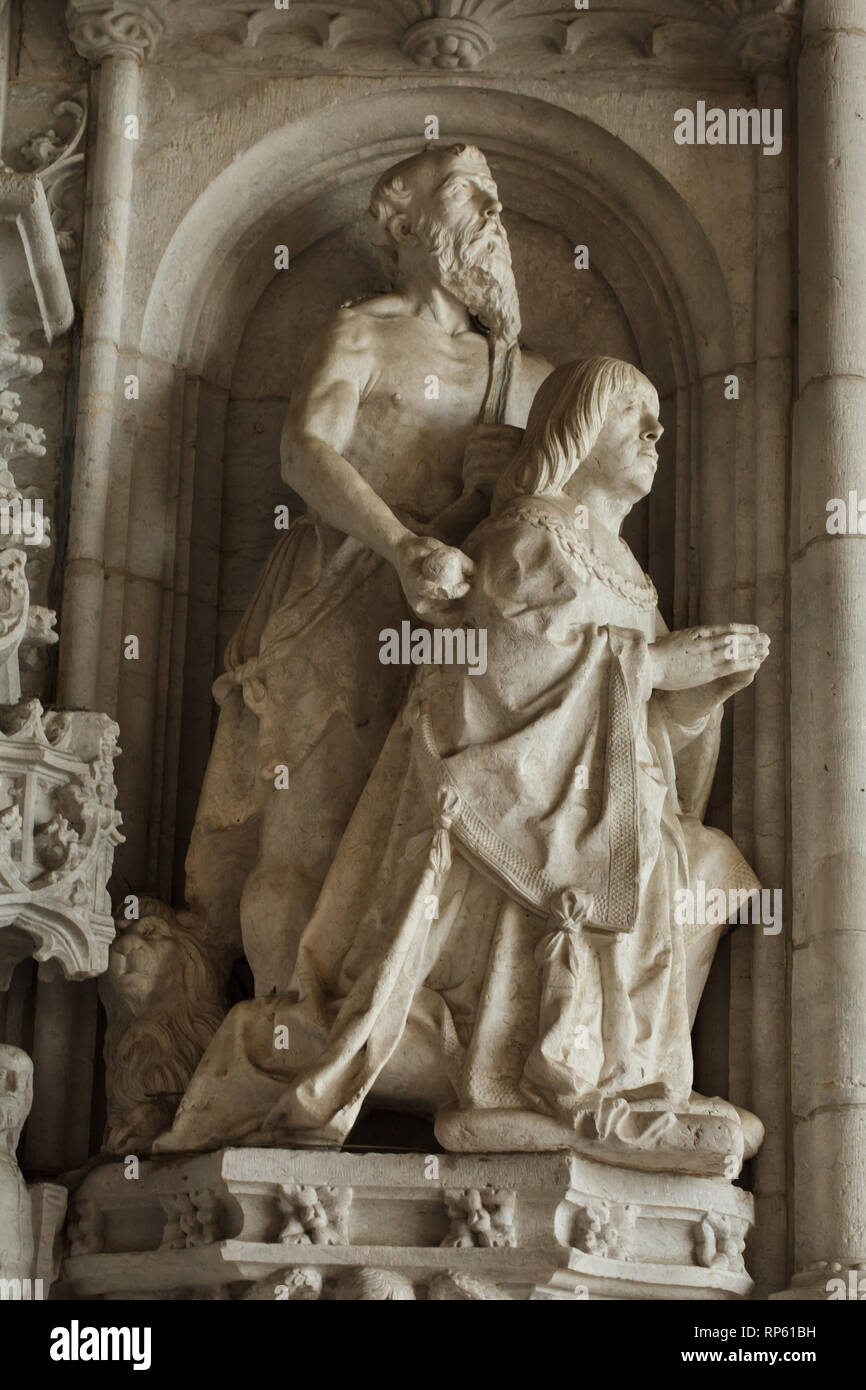 King Manuel I of Portugal and Saint Jerome depicted in the Manueline western portal of the Church of Santa Maria de Belém (Igreja de Santa Maria de Belém) of the Jerónimos Monastery (Mosteiro dos Jerónimos) in Belém district in Lisbon, Portugal. The portal was carved by French sculptor Nicolau Chantereine in 1517-1518. Stock Photo