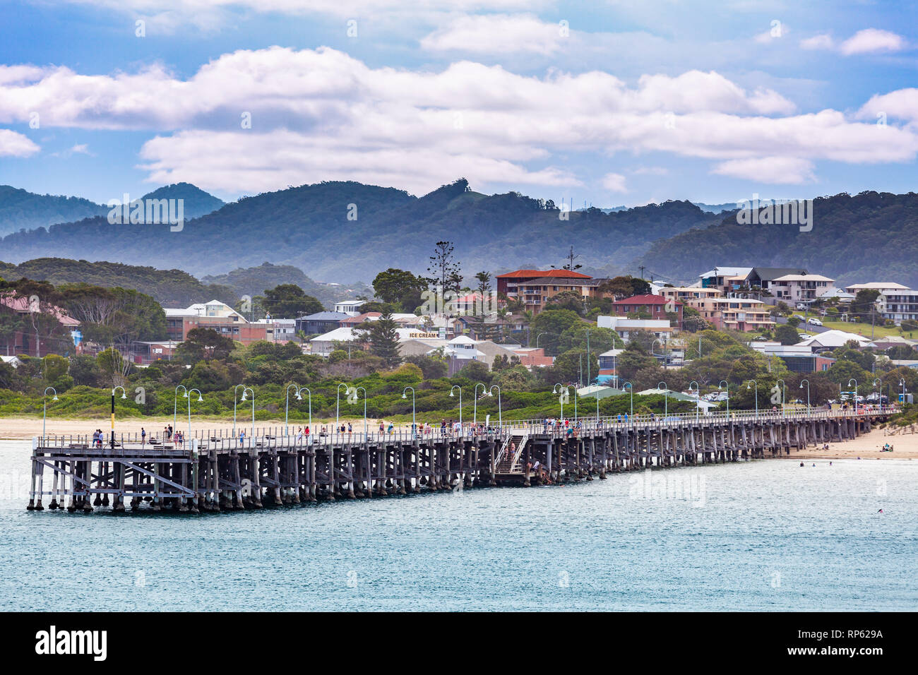 People walking on Coffs Harbour Jetty Stock Photo Alamy