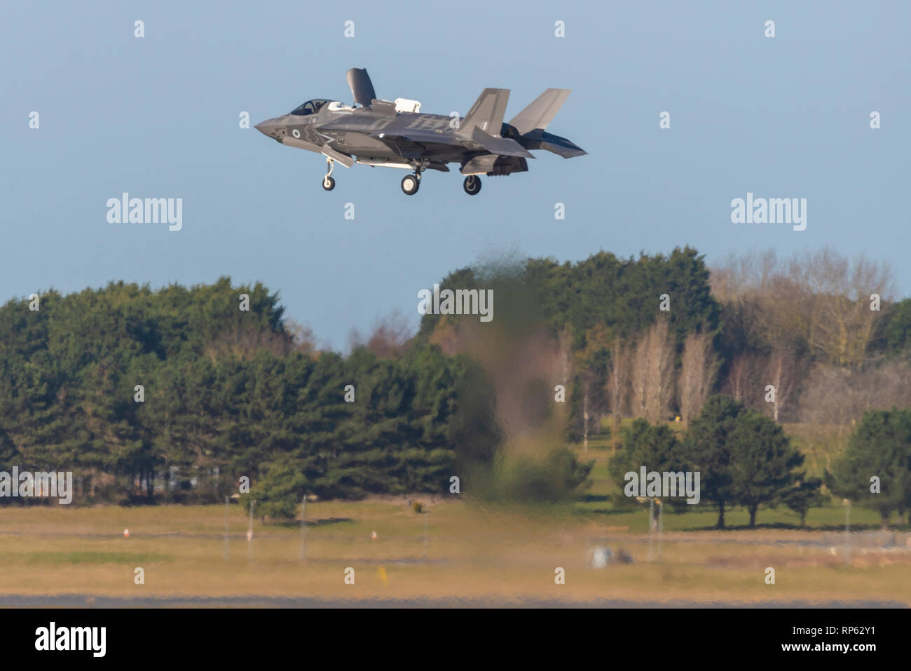 Royal Air Force RAF Lockheed Martin F-35B Lightning II stealth jet fighter plane at RAF Marham, Norfolk, UK. Vertical landing with doors open Stock Photo