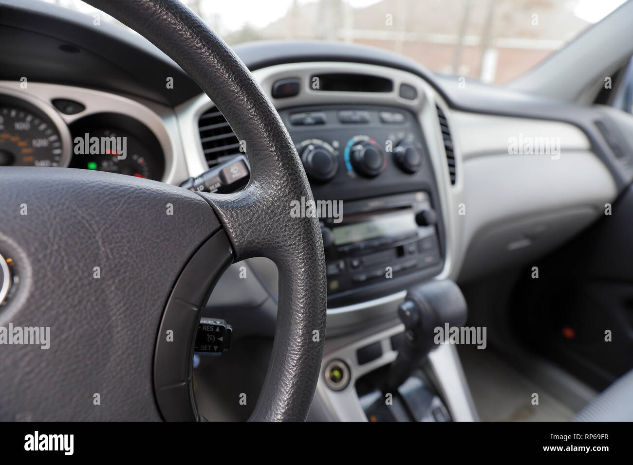 vehicle steering wheel, gear shift, radio and climate controls - interior, front, dashboard Stock Photo