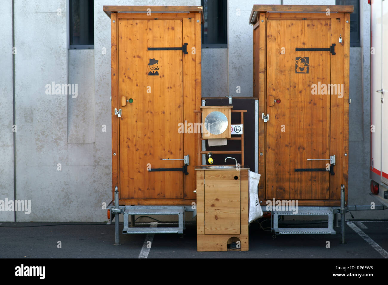 Wooden transportable camping toilets with a sink Stock Photo Alamy
