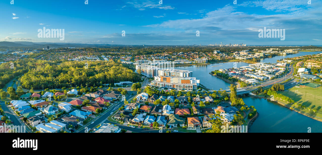 Aerial panorama of luxury real estate at Varsity Lakes suburb on Gold