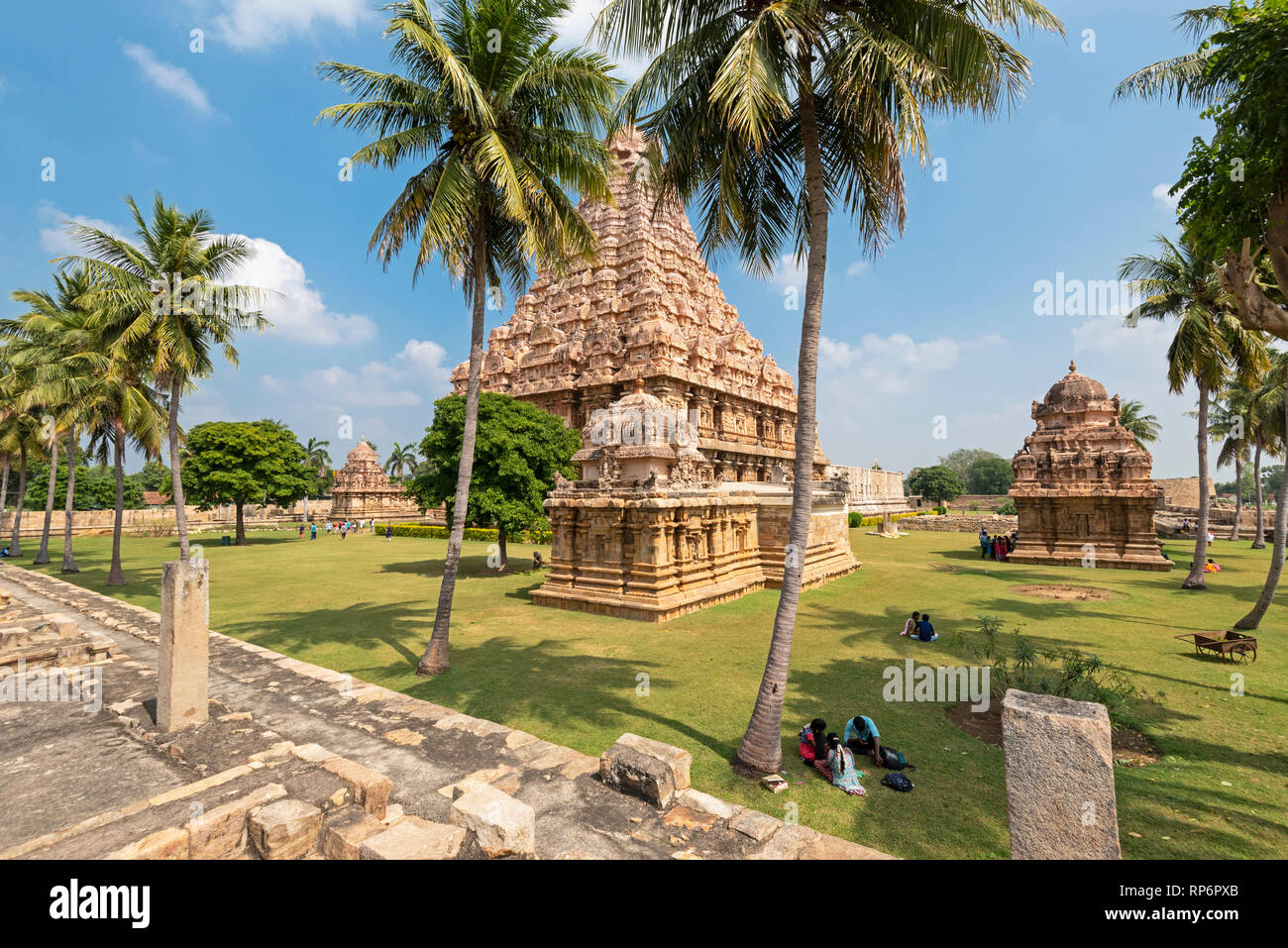 The Brihadisvara Temple at Gangaikonda Cholapuram with tourists visiting on  a sunny day with blue sky Stock Photo - Alamy