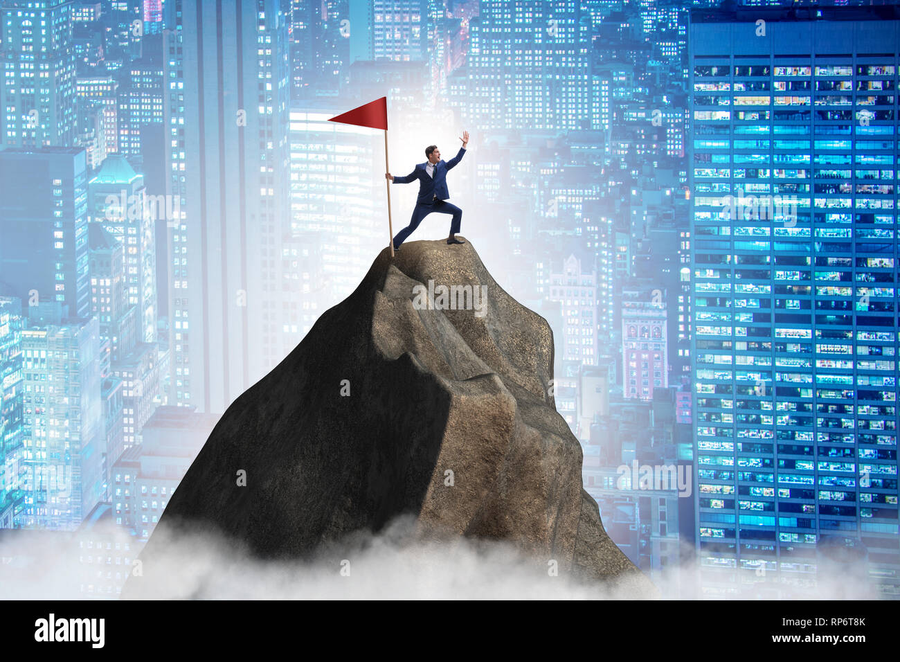 Businessman at the top of mountain Stock Photo - Alamy